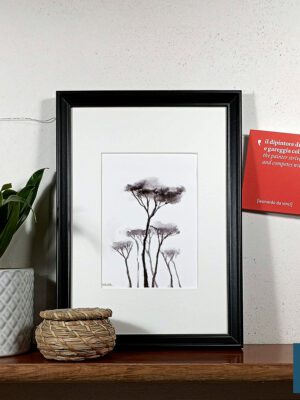 a giclée print featuring pine trees
