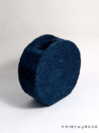 indigo blue papier mache decorative vase with a circular shape