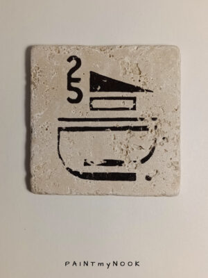 2025 coaster Travertine coaster with a dark brown modernist graphic printed on it