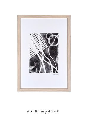 Gel plate monoprint featuring a black and white abstract design