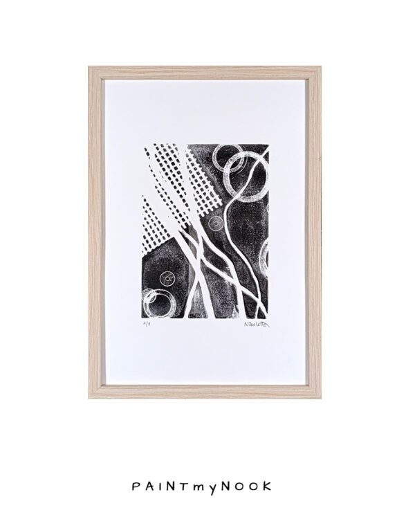 Gel plate monoprint featuring a black and white abstract design