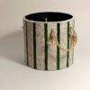 A green striped planter cover