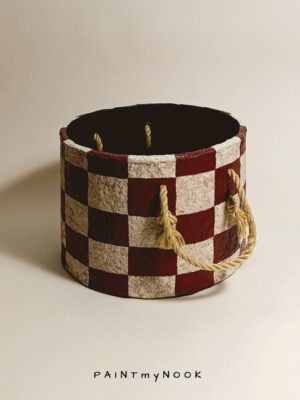 red checker pot papier mache cylindrical planter cover with a check pattern in cherry red and beige colors κασπω
