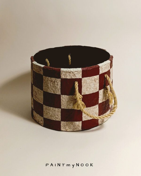 papier mache cylindrical planter cover with a check pattern in cherry red and beige colors κασπω