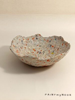Sunset bowl A beige papier mache bowl with orange details