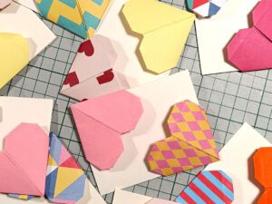 Pairs of colorful origami heart bookmarks