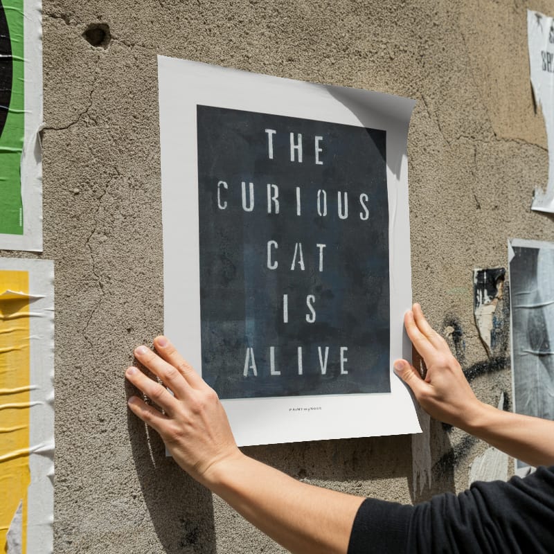 The curious cat poster attached to wall mockup